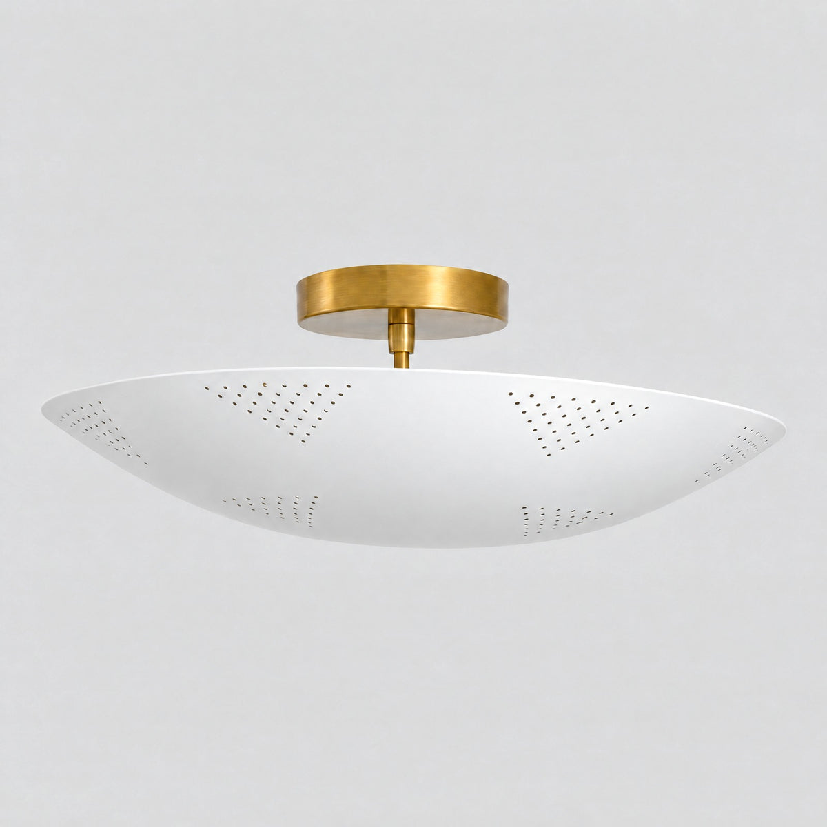 Perforated Dome Semi Flush Mount, three-quarter view from the left, solid brass semi flush mount by BrassBeam