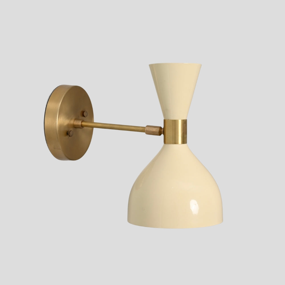 Mid century brass wall lamp featuring sculptural cream hourglass shade