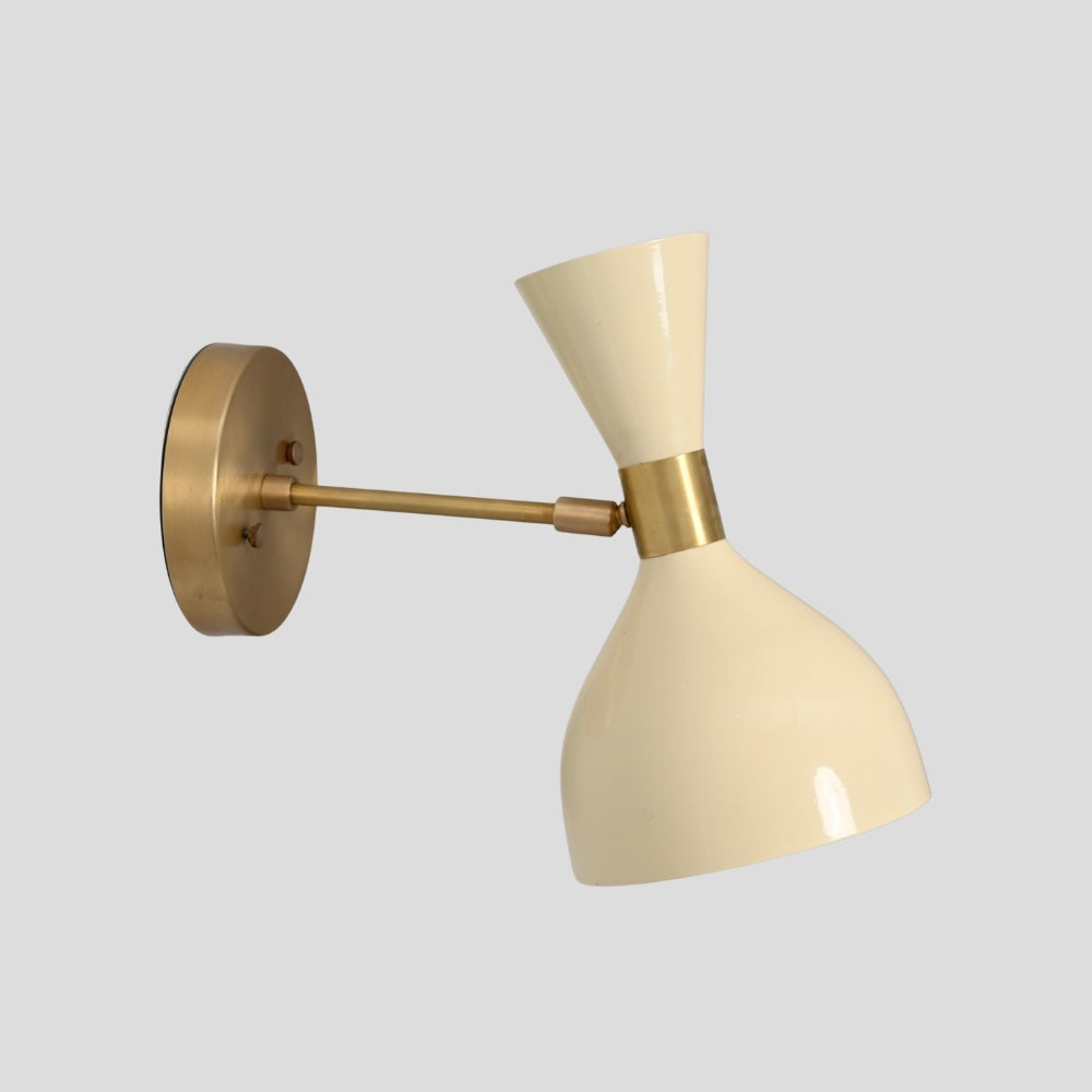 Brass wall lamp with soft cream hourglass shade for hallway or bedside light