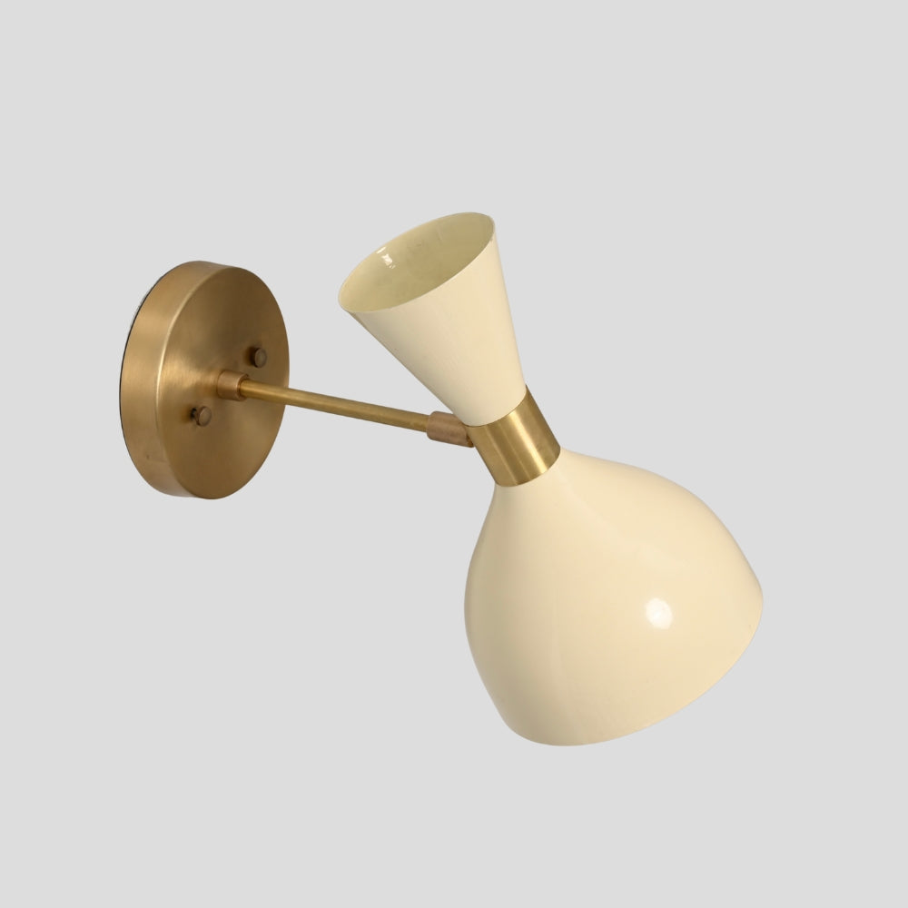Cream shade wall light with solid brass arm and base