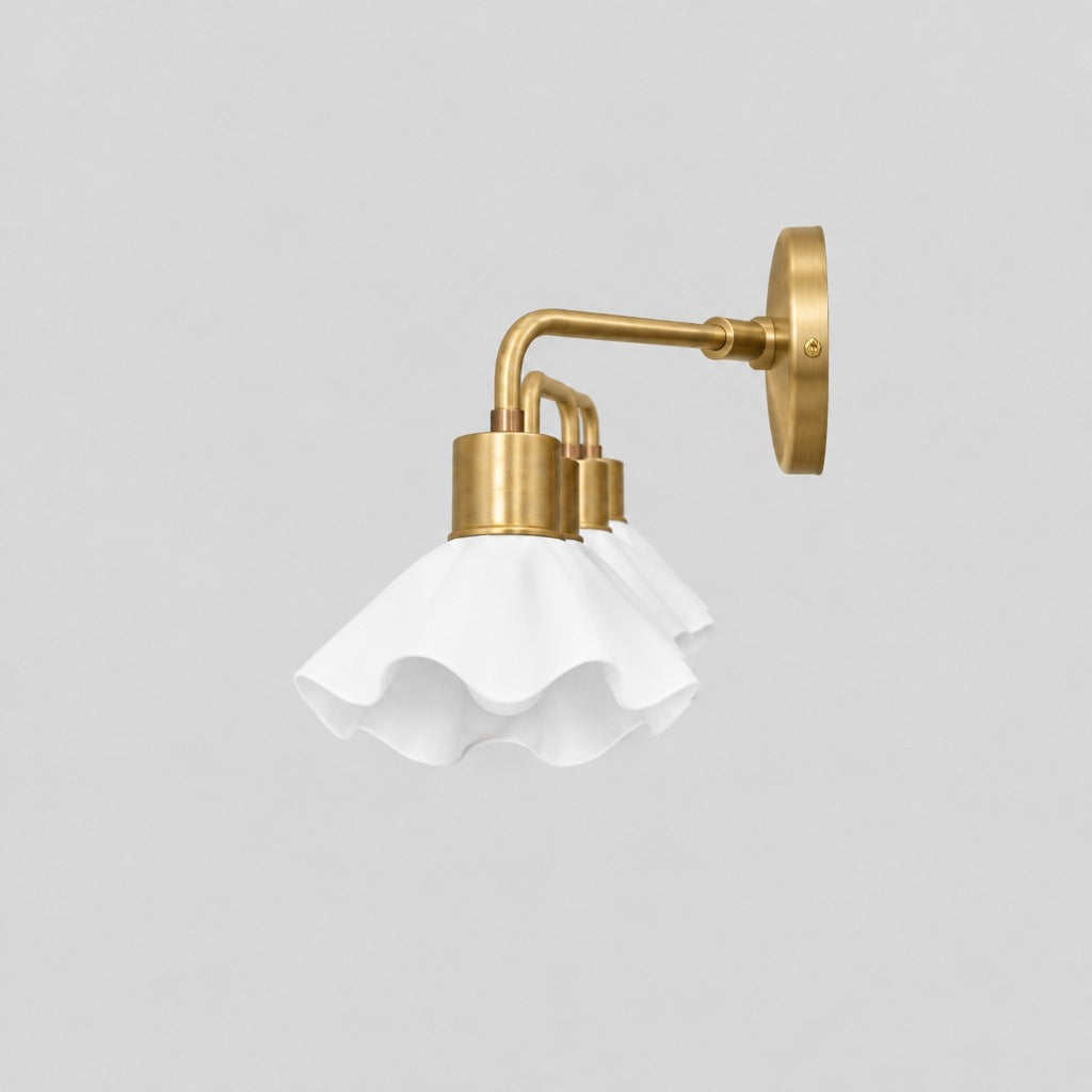Triple Flower Wall Sconce, side view showing depth, solid brass vanity light by BrassBeam