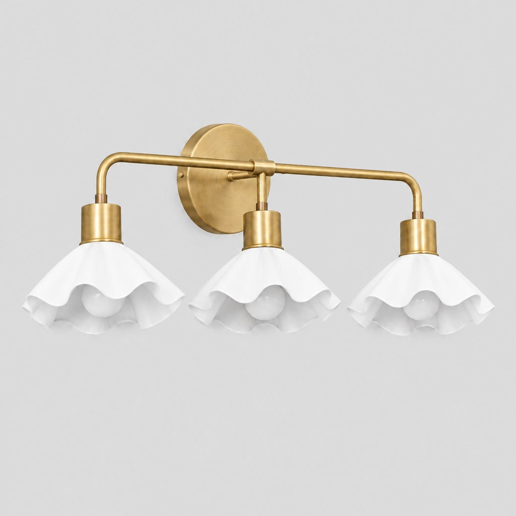 Triple Flower Wall Sconce, three-quarter view from the left, solid brass vanity light by BrassBeam