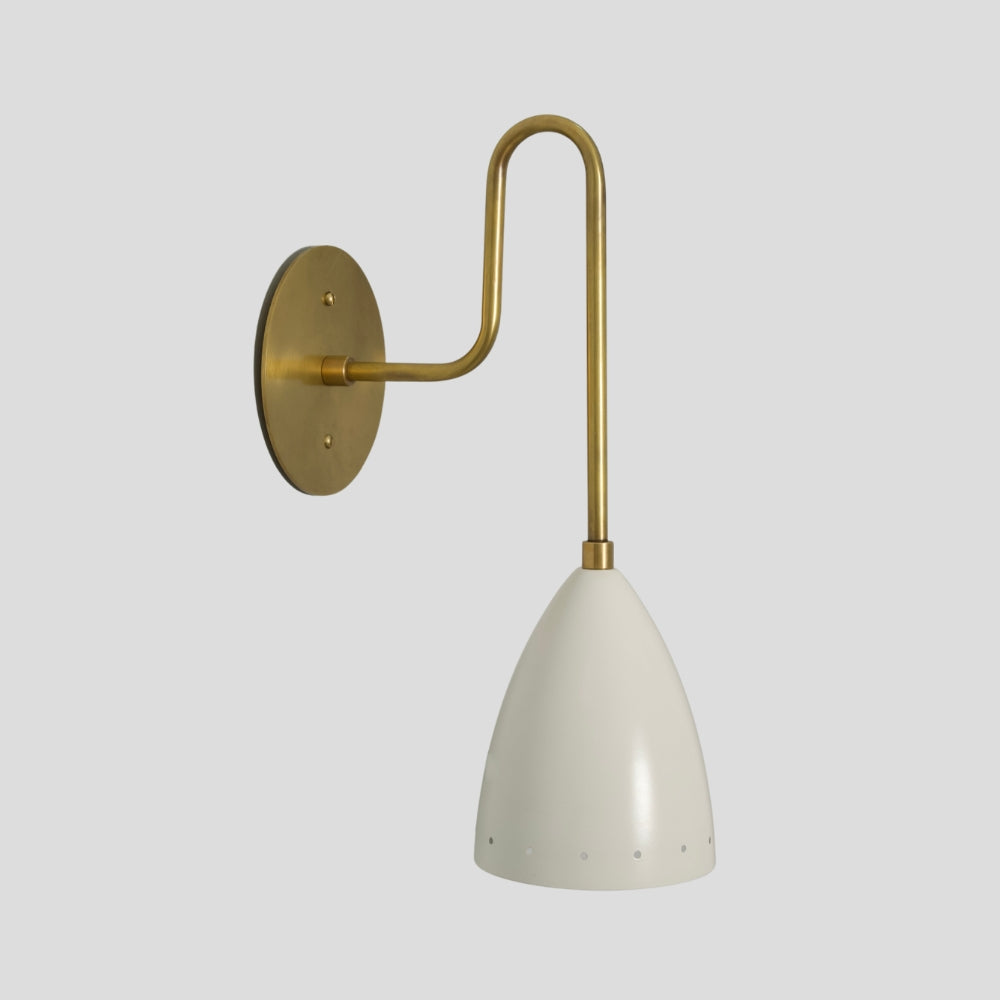 Handcrafted brass sconce with sculptural long arm and dome-shaped perforated shade