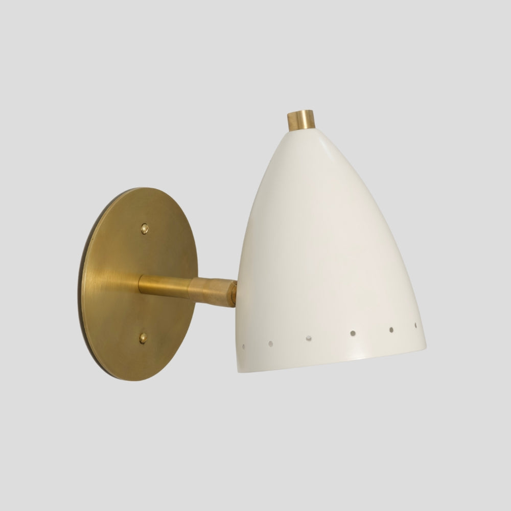 Mid-century modern bullet shade wall sconce in matte white with solid brass arm