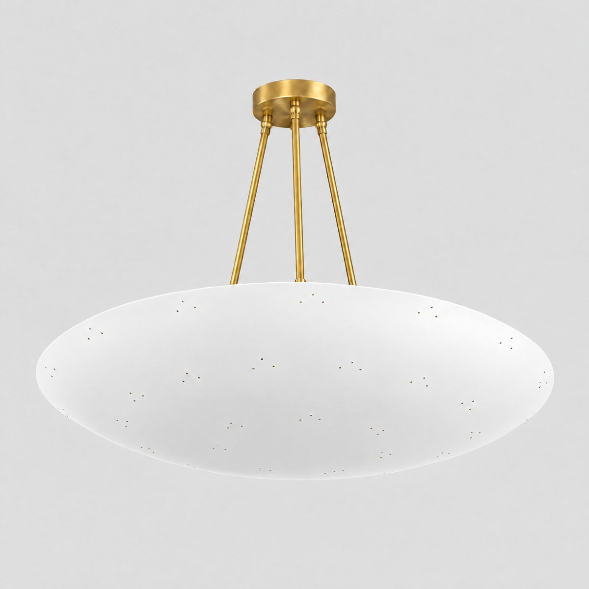 Perforated Dome Pendant, three-quarter view from the right, solid brass dome pendant by BrassBeam