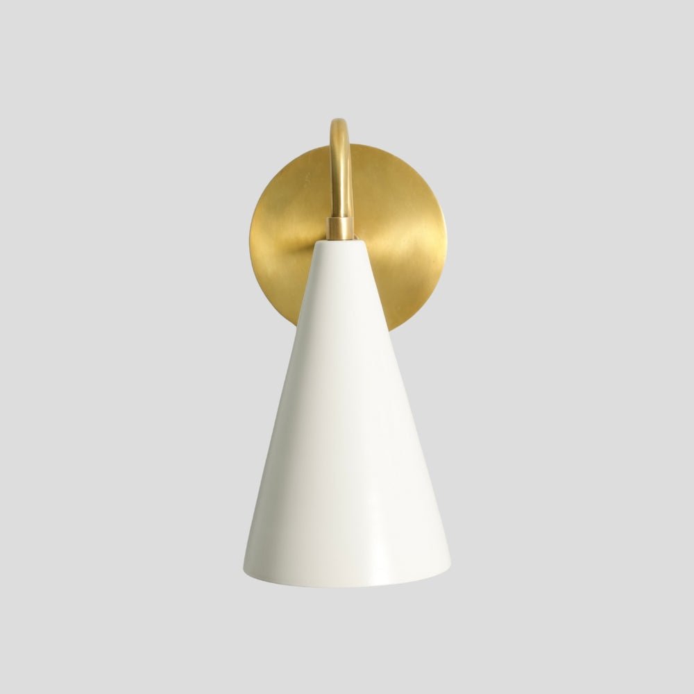 White cone wall light with solid brass arm for hallway, living room or bedside accent lighting.