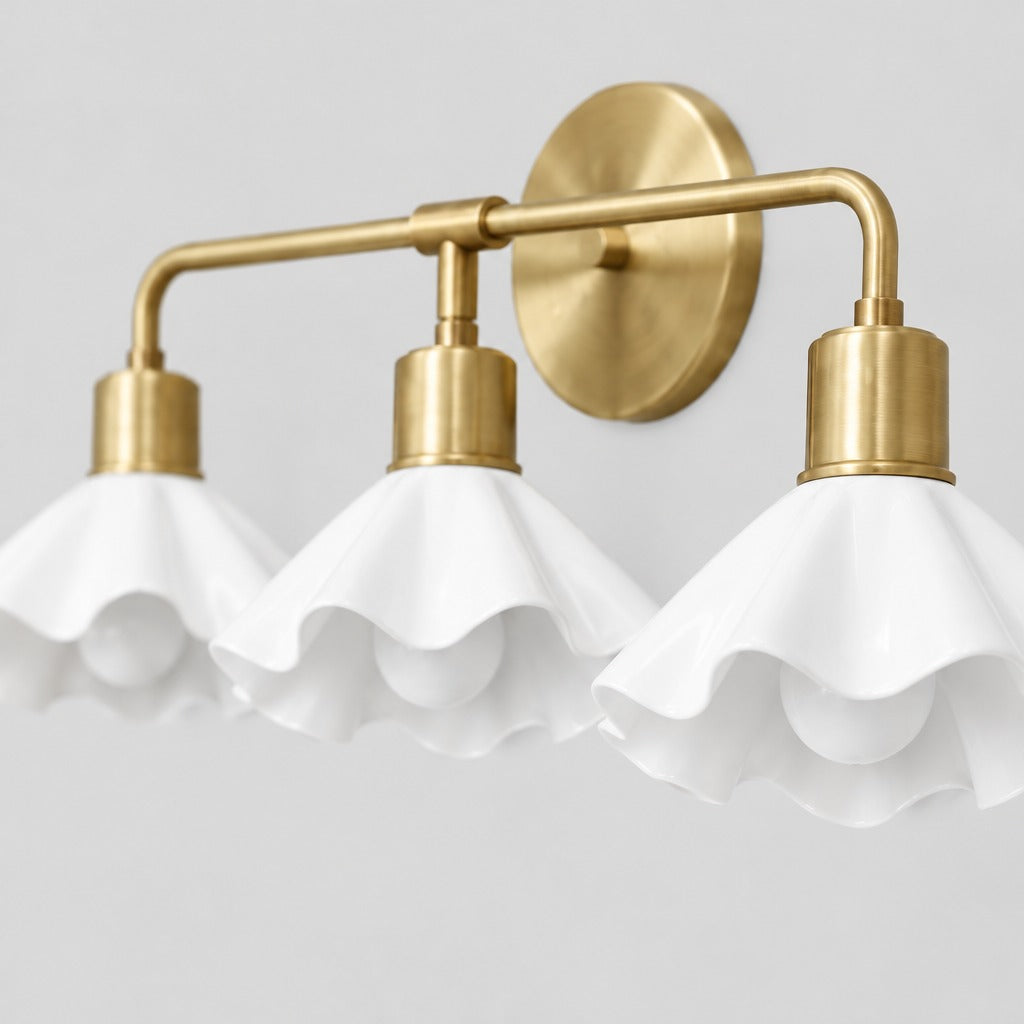 Triple Flower Wall Sconce, close-up of the solid brass details and finish, solid brass vanity light by BrassBeam