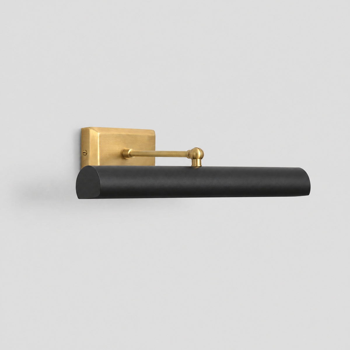 Brass picture light, three-quarter view from the right, by BrassBeam
